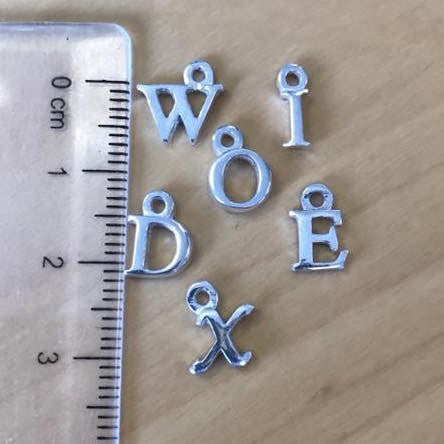 Moulded letters after firing, using Art Clay Silver 999