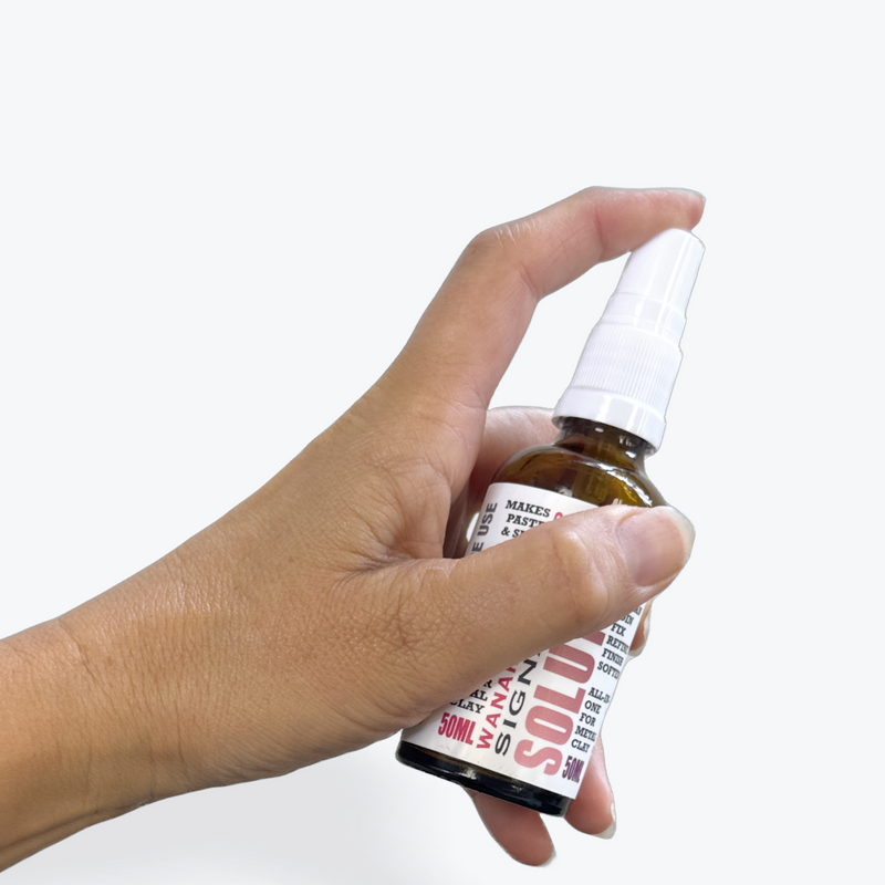 Add a spray to use the solution to extend the work life of your clay.
