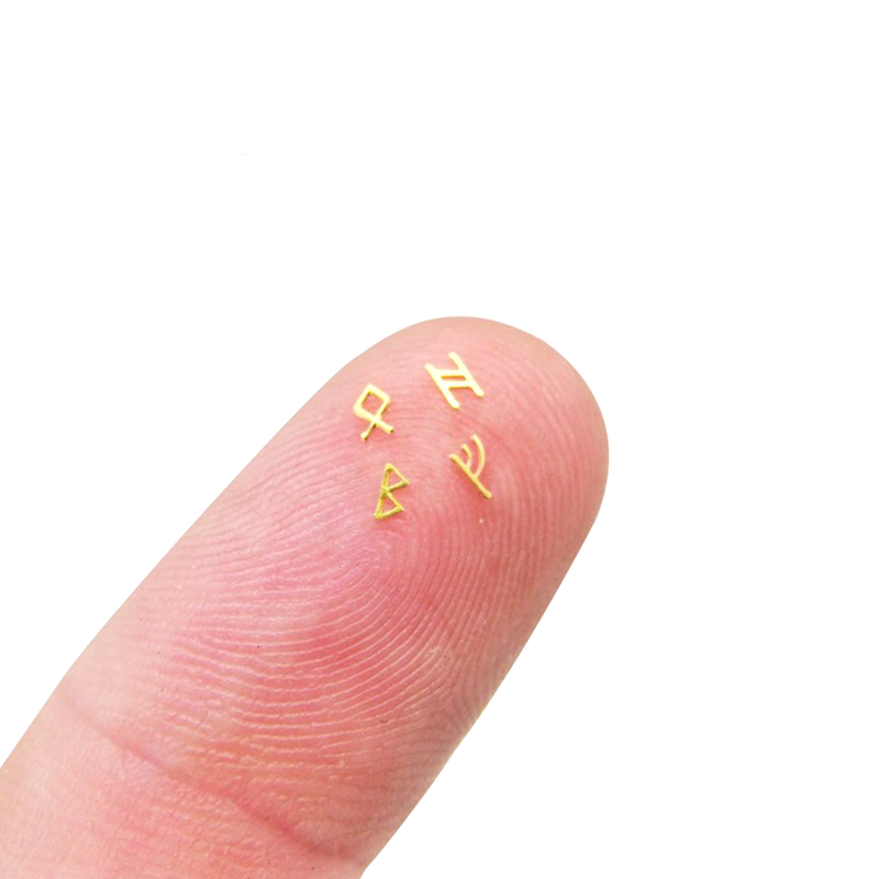 Tiny brass dwarven letters.