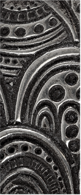 Texture in fired silver clay.