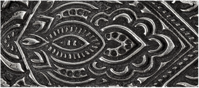 Texture in fired silver clay.