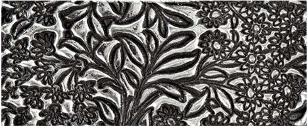 Texture in fired silver clay.