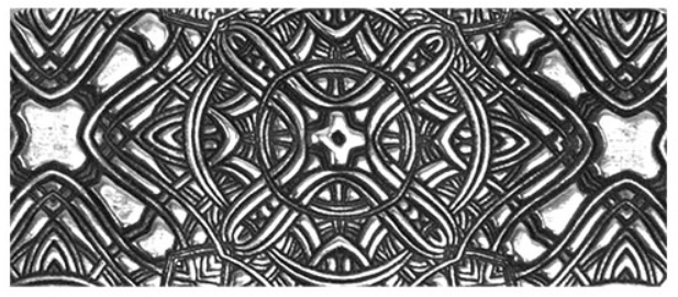 Example of Interwoven Diamond Texture in silver clay.